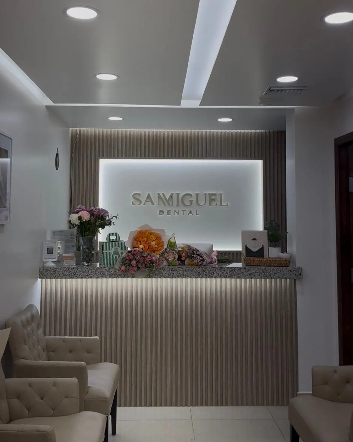 San Miguel Dental waiting room with warm wood finishes and comfortable seating