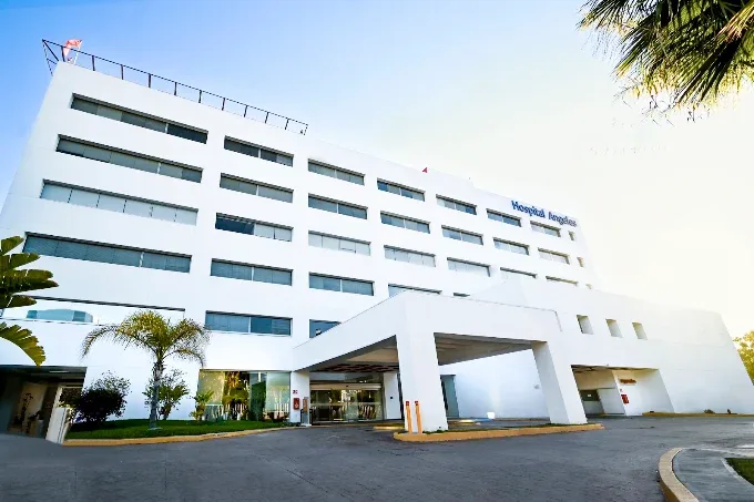 White exterior and covered entrance of Hospital Angeles Tijuana