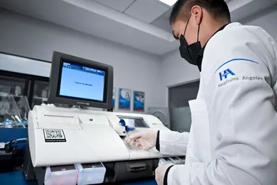 Laboratory technician at Hospital Angeles Tijuana running diagnostic samples