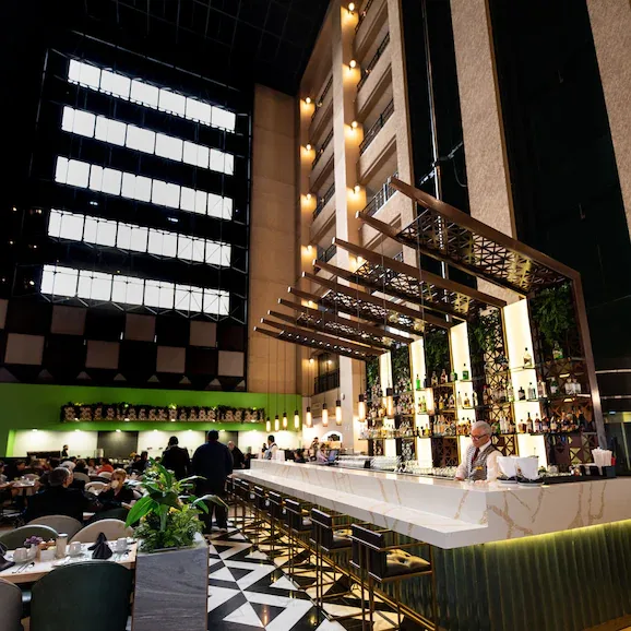Marble atrium bar and restaurant inside Hotel Pueblo Amigo