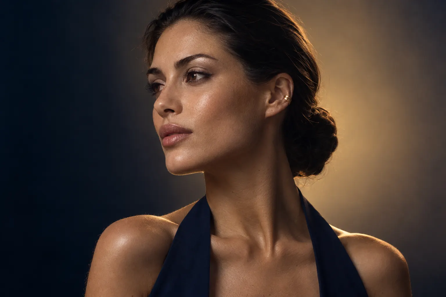 Buccal fat removal patient with sculpted cheekbones and a defined jawline in profile portrait